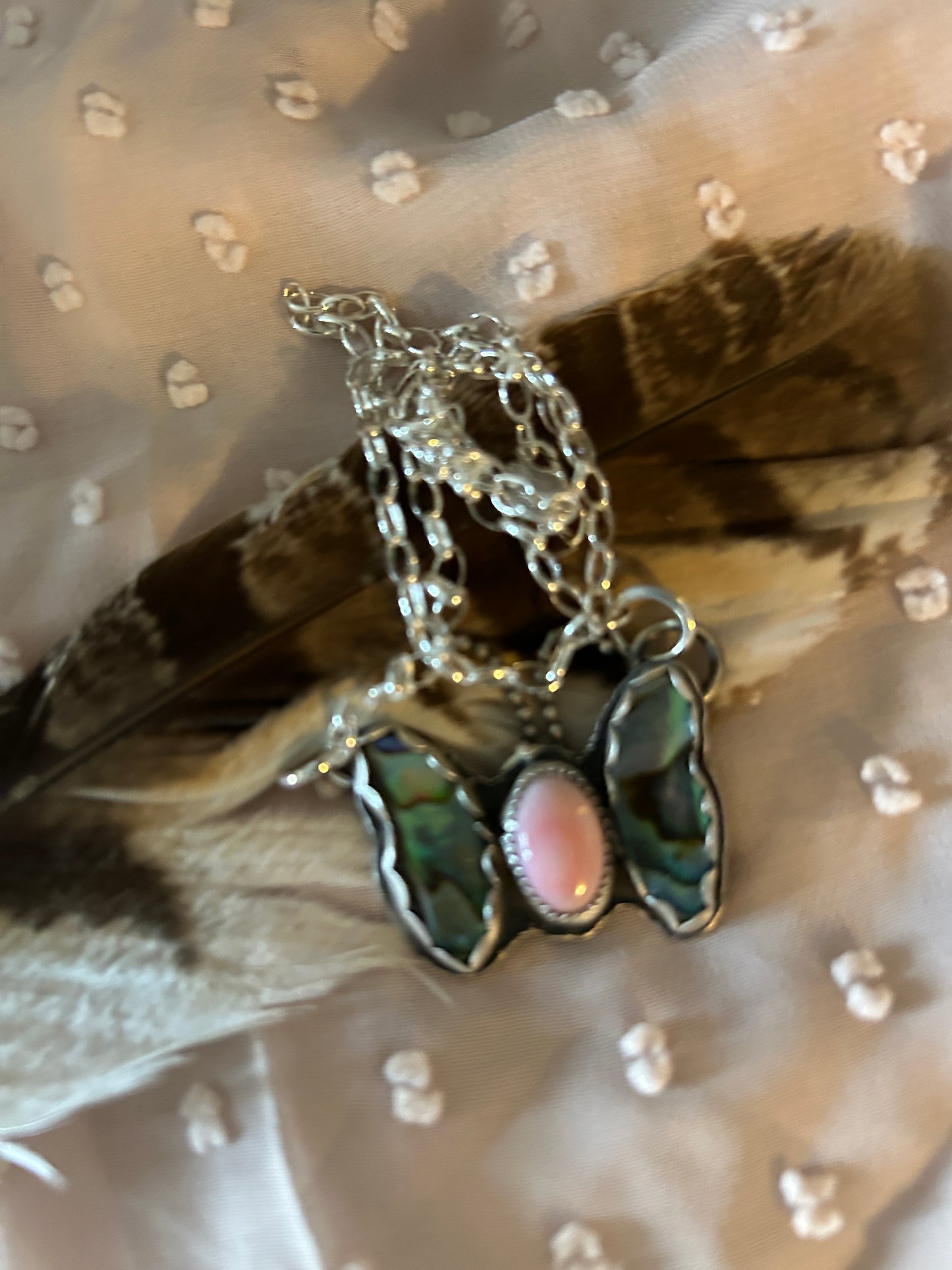 Rainbow flash abalone shell with pink conch